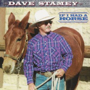 A man standing next to a horse on the cover of a cd.